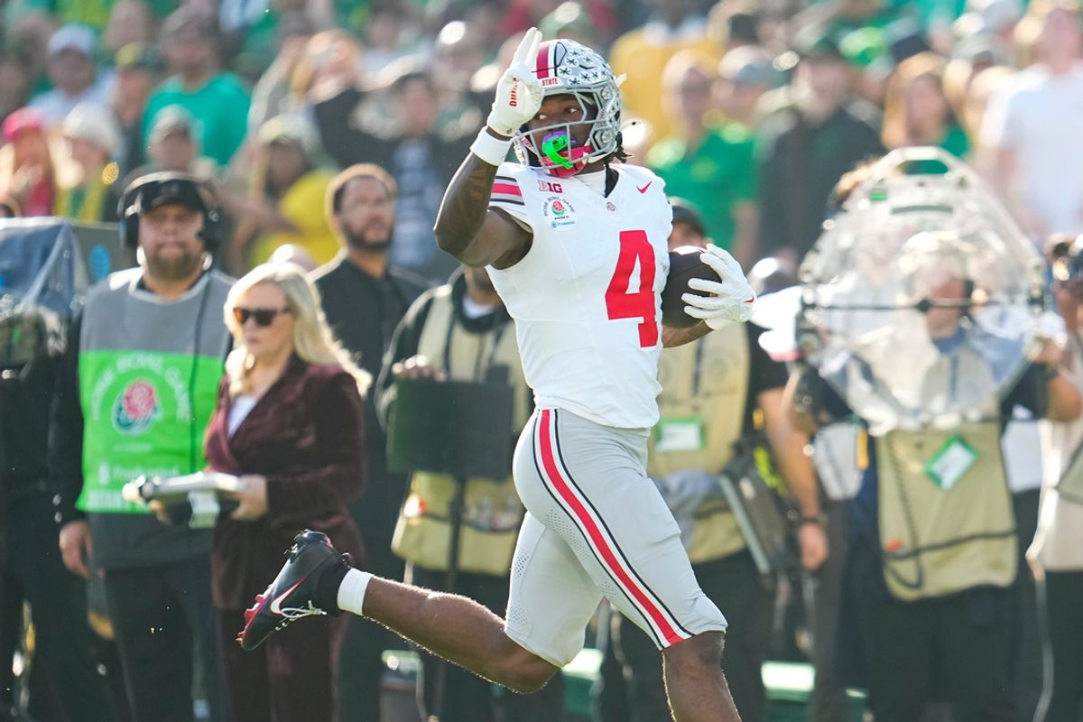 Ohio State Buckeyes wide receiver Jeremiah Smith (4) scores a touchdown during the first half of the College Football Playoff quarterfinal against the Oregon Ducks at the Rose Bowl in Pasadena, Calif. on Jan. 1, 2025.