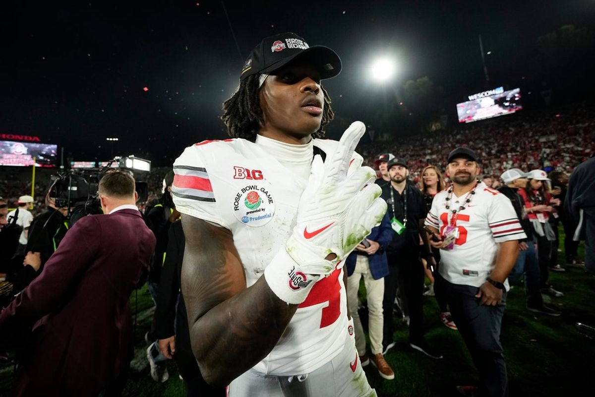 Ohio State Buckeyes wide receiver Jeremiah Smith (4) celebrates following the 41-21 win over the Oregon Ducks in the College Football Playoff quarterfinal at the Rose Bowl in Pasadena, Calif. on Jan. 1, 2025.