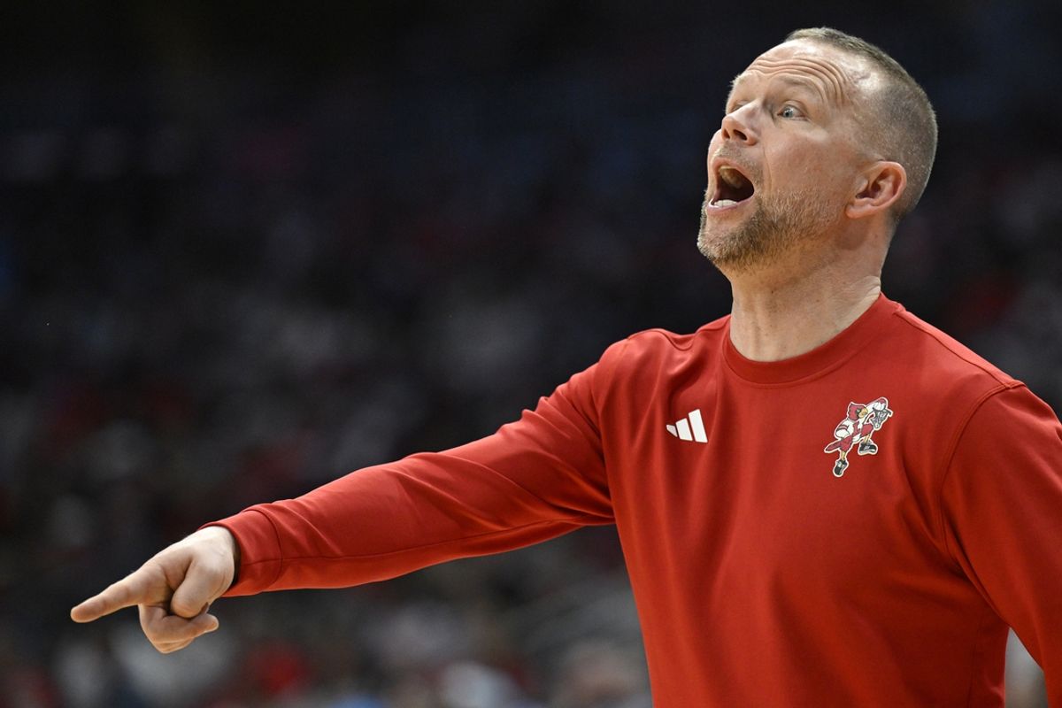 Jan 1, 2025; Louisville, Kentucky, USA;  Louisville Cardinals head coach Pat Kelsey calls out instructions during the second half against the North Carolina Tar Heels at KFC Yum! Center. Mandatory Credit: Jamie Rhodes-Imagn Images