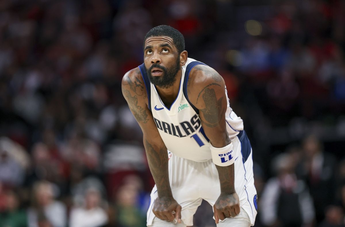 Jan 1, 2025; Houston, Texas, USA; Dallas Mavericks guard Kyrie Irving (11) looks up during the fourth quarter against the Houston Rockets at Toyota Center. Mandatory Credit: Troy Taormina-Imagn Images