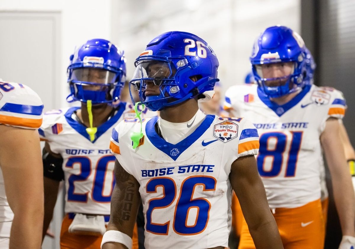 Dec 31, 2024; Glendale, AZ, USA; Boise State Broncos running back Sire Gaines (26) against the Penn State Nittany Lions during the Fiesta Bowl at State Farm Stadium. Mandatory Credit: Mark J. Rebilas-Imagn Images