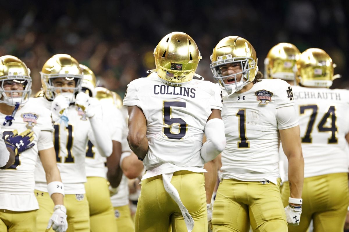 Jan 2, 2025; New Orleans, LA, USA; Notre Dame Fighting Irish wide receiver Beaux Collins (5) celebrates after scoring a touch down during the second quarter against Georgia Bulldogs at Caesars Superdome. Mandatory Credit: Amber Searls-Imagn Images