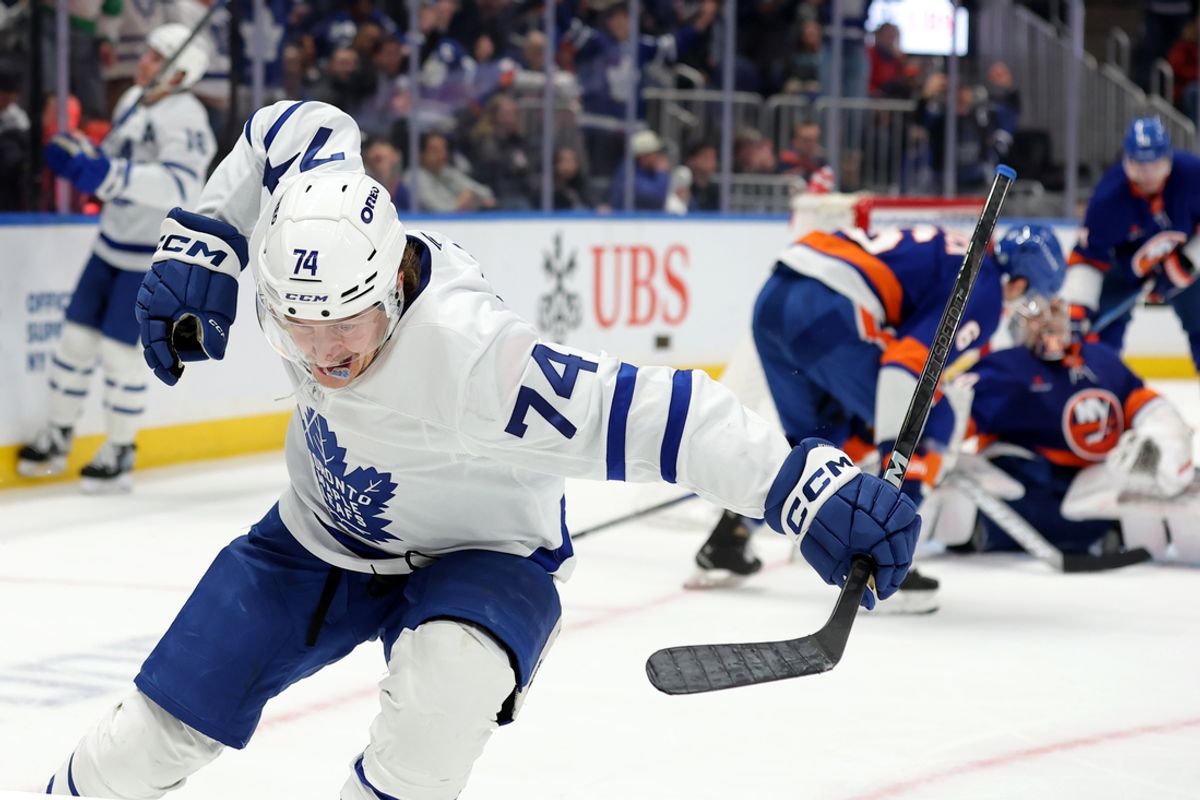 Jan 2, 2025; Elmont, New York, USA; Toronto Maple Leafs center Bobby McMann (74) celebrates his goal against New York Islanders goaltender Ilya Sorokin (30) during the third period at UBS Arena. Mandatory Credit: Brad Penner-Imagn Images