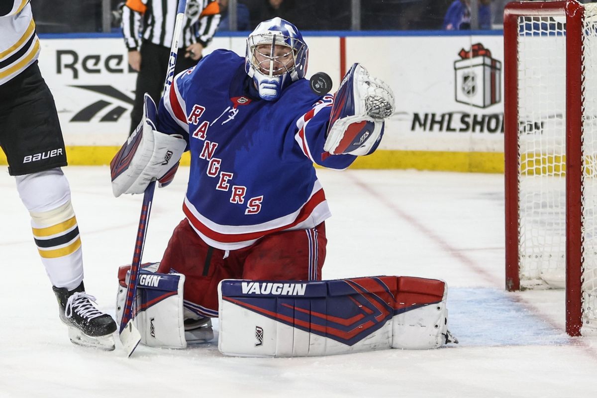 Jan 2, 2025; New York, New York, USA; New York Rangers goaltender Jonathan Quick (32) makes a save on a shot on goal attempt in the third period against the Boston Bruins at Madison Square Garden. Mandatory Credit: Wendell Cruz-Imagn Images