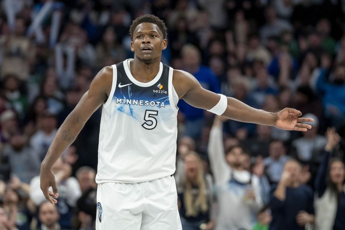 Jan 2, 2025; Minneapolis, Minnesota, USA; Minnesota Timberwolves guard Anthony Edwards (5) celebrates after making a three point shot against the Boston Celtics in the second half at Target Center. Mandatory Credit: Jesse Johnson-Imagn Images