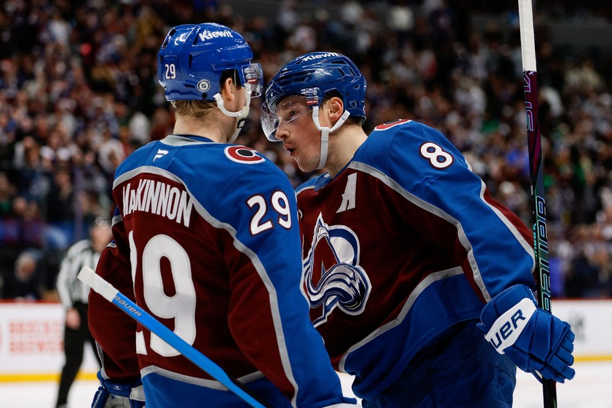 Jan 2, 2025; Denver, Colorado, USA; Colorado Avalanche defenseman Cale Makar (8) celebrates his goal with center Nathan MacKinnon (29) in the second period against the Buffalo Sabres at Ball Arena. Mandatory Credit: Isaiah J. Downing-Imagn Images