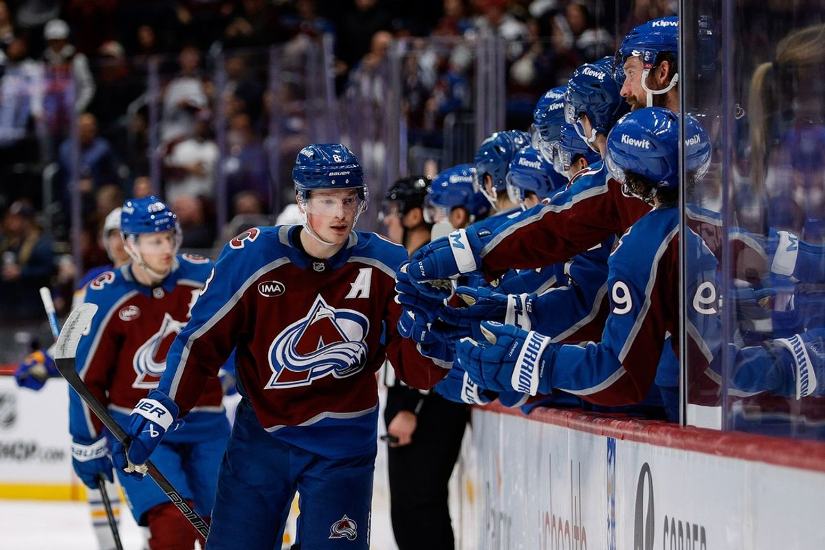 Jan 2, 2025; Denver, Colorado, USA; Colorado Avalanche defenseman Cale Makar (8) celebrates with the bench after his goal in the third period against the Buffalo Sabres at Ball Arena. Mandatory Credit: Isaiah J. Downing-Imagn Images