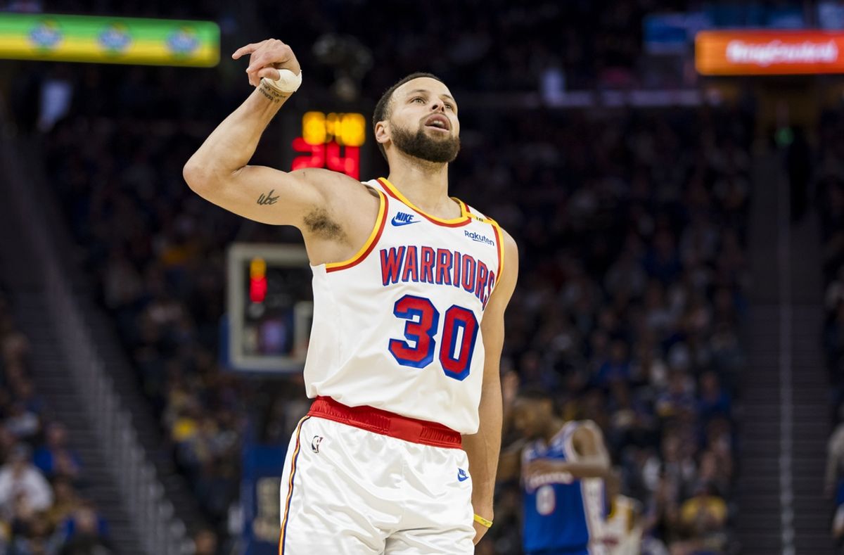 Jan 2, 2025; San Francisco, California, USA; Golden State Warriors guard Stephen Curry (30) reacts after scoring against the Philadelphia 76ers during the third quarter at Chase Center. Mandatory Credit: John Hefti-Imagn Images