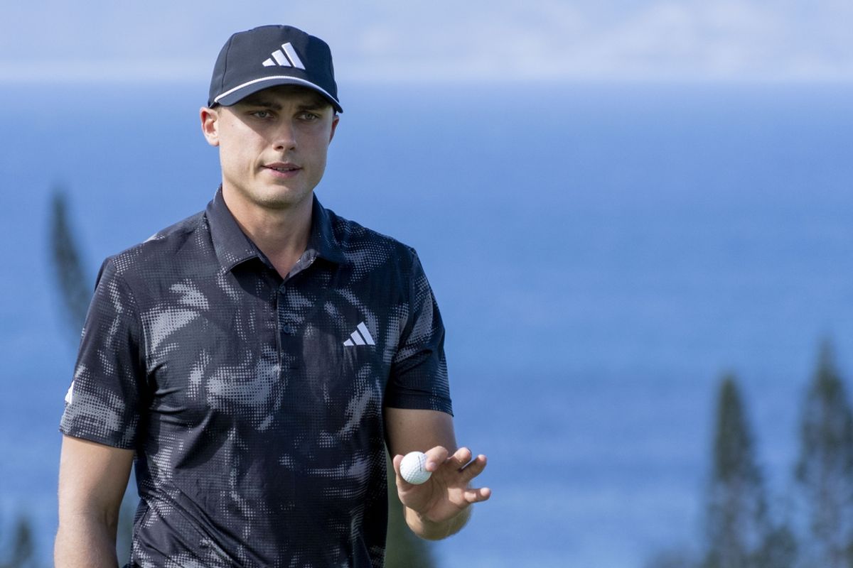 January 3, 2025; Maui, Hawaii, USA; Ludvig Aberg acknowledges the crowd after making his putt on the 10th hole during the second round of The Sentry golf tournament at Plantation Course at Kapalua. Mandatory Credit: Kyle Terada-Imagn Images