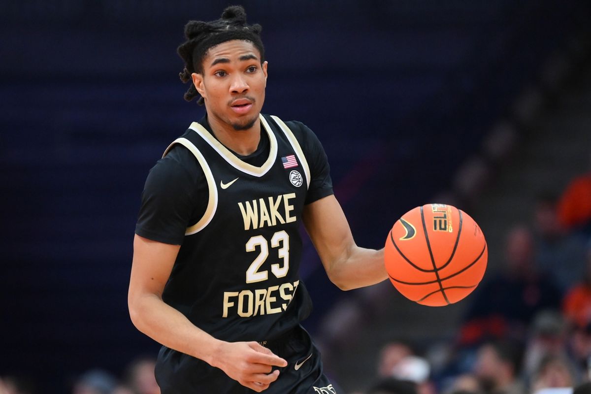 Dec 31, 2024; Syracuse, New York, USA; Wake Forest Demon Deacons guard Hunter Sallis (23) dribbles during the second half against the Syracuse Orange at the JMA Wireless Dome. Mandatory Credit: Rich Barnes-Imagn Images