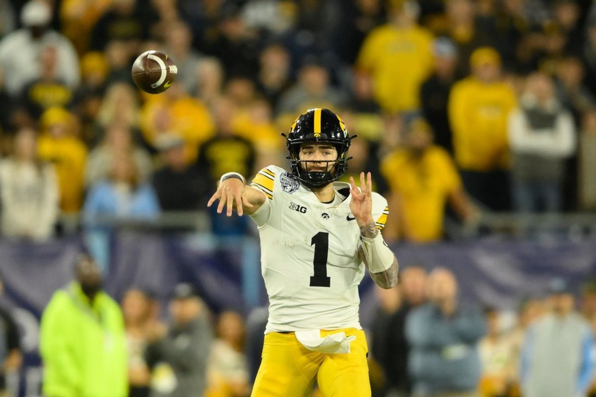 Dec 30, 2024; Nashville, TN, USA;  Iowa Hawkeyes quarterback Brendan Sullivan (1) throws a pass against the Missouri Tigers during the second half at Nissan Stadium. Mandatory Credit: Steve Roberts-Imagn Images