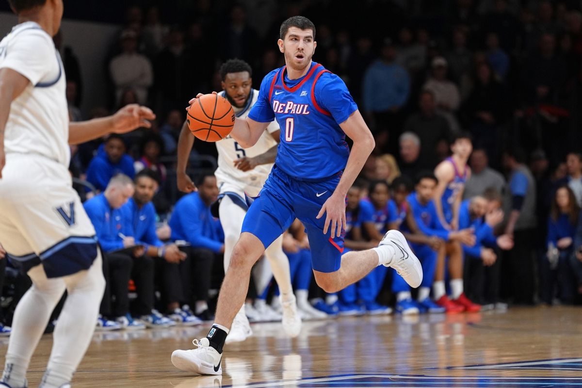Jan 4, 2025; Villanova, Pennsylvania, USA; DePaul Blue Demons forward Troy D'Amico (0) controls the ball against the Villanova Wildcats in the first half at William B. Finneran Pavilion. Mandatory Credit: Kyle Ross-Imagn Images
