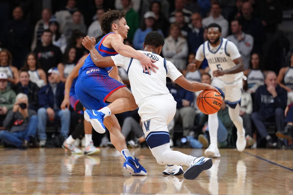 Jan 4, 2025; Villanova, Pennsylvania, USA; Villanova Wildcats guard Jhamir Brickus (2) collides with DePaul Blue Demons guard Jacob Meyer (12) in the first half at William B. Finneran Pavilion. Mandatory Credit: Kyle Ross-Imagn Images