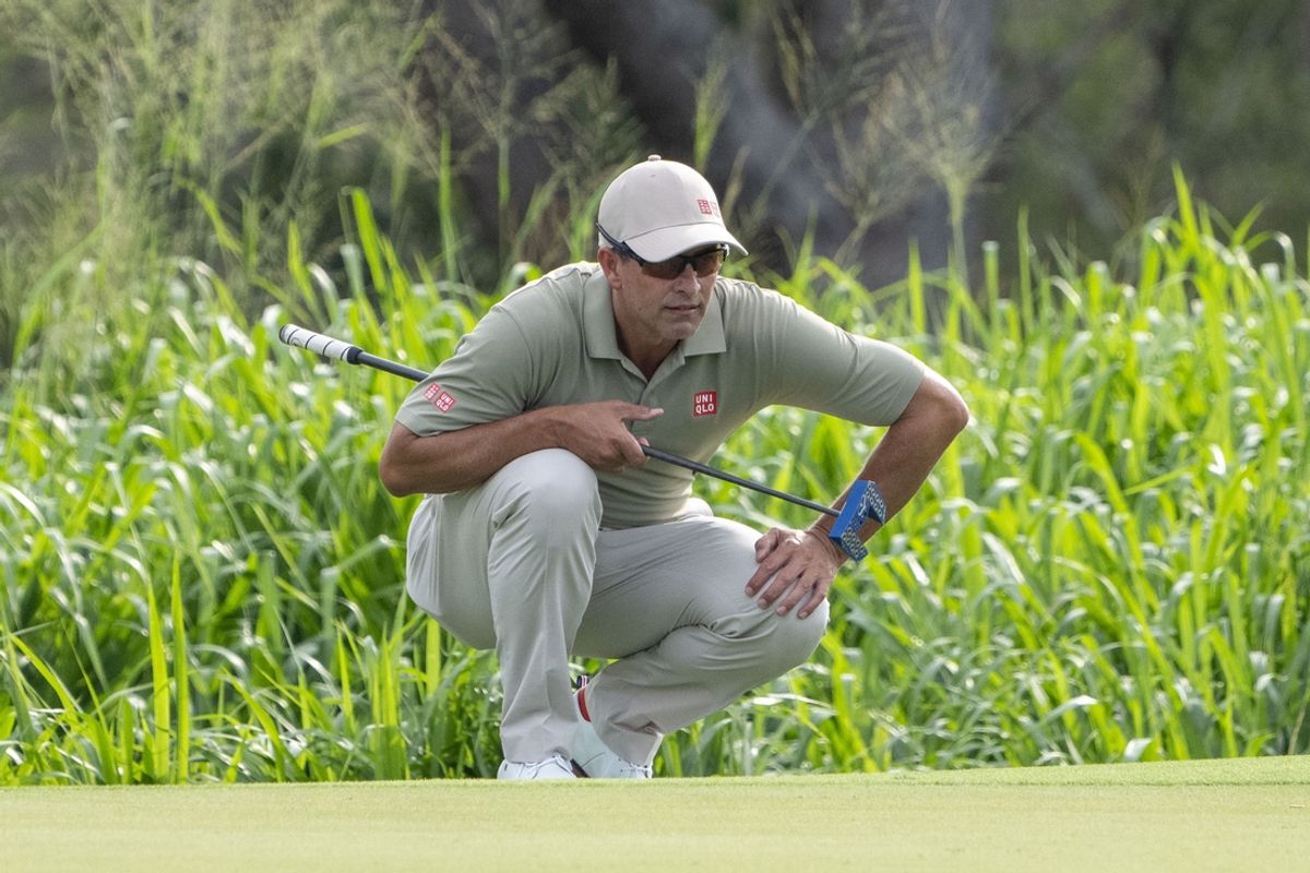 January 4, 2025; Maui, Hawaii, USA; Adam Scott lines up his putt on the fourth hole during the third round of The Sentry golf tournament at Plantation Course at Kapalua. Mandatory Credit: Kyle Terada-Imagn Images