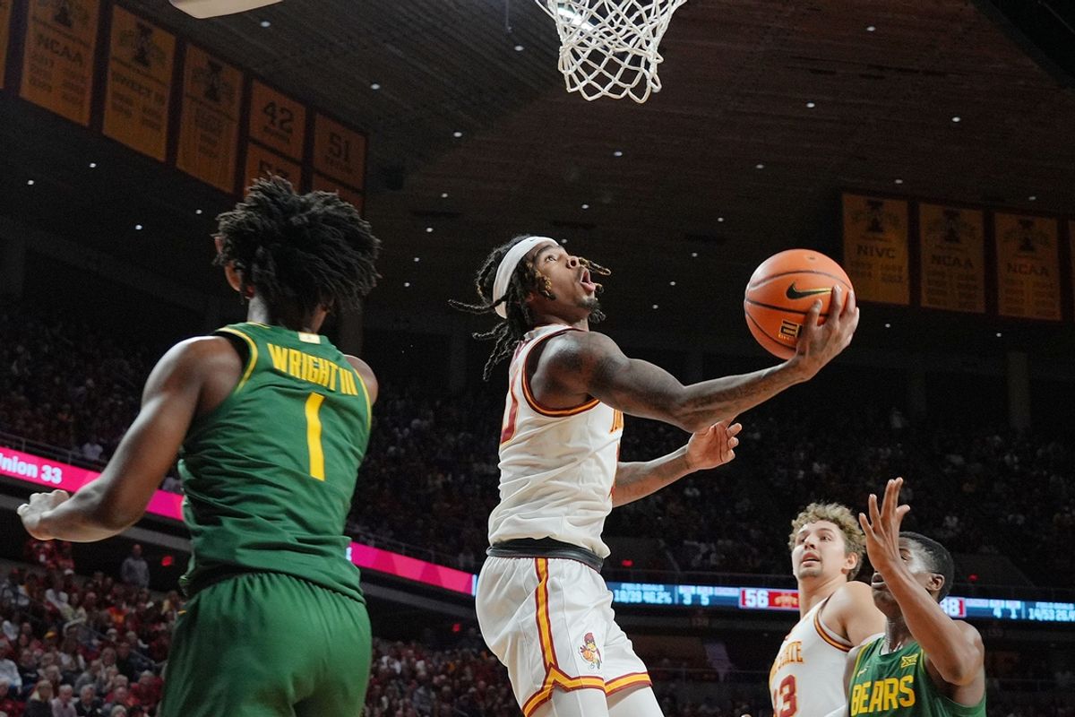 Iowa State Cyclones guard Keshon Gilbert (10) goes for a layup between Baylor Bears guard Robert O. Wright III (1) and guard VJ Edgecombe (7) during the second half in the NCAA men’s basketball at Hilton Coliseum on Saturday, Jan. 4, 2025, in Ames, Iowa.