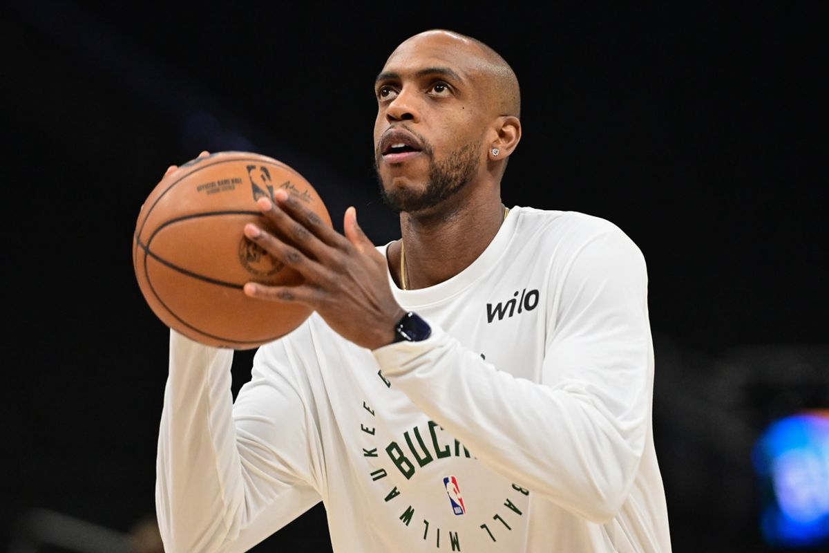 Jan 4, 2025; Milwaukee, Wisconsin, USA; Milwaukee Bucks forward Khris Middleton (22) warms up before game against the Portland Trail Blazers at Fiserv Forum. Mandatory Credit: Benny Sieu-Imagn Images