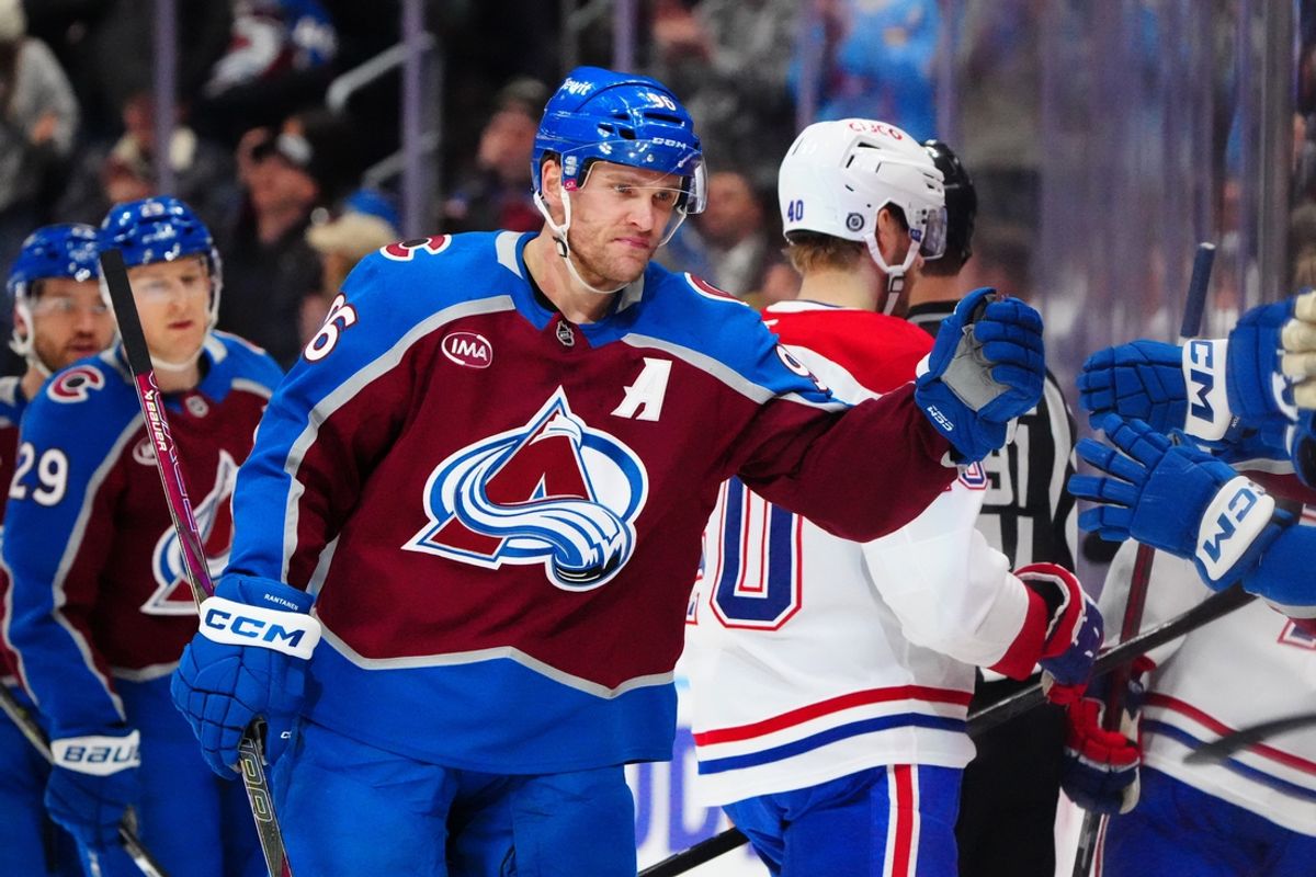 Jan 4, 2025; Denver, Colorado, USA; Colorado Avalanche right wing Mikko Rantanen (96) celebrates after scoring a goal against the Montreal Canadiens in the first period at Ball Arena. Mandatory Credit: Ron Chenoy-Imagn Images