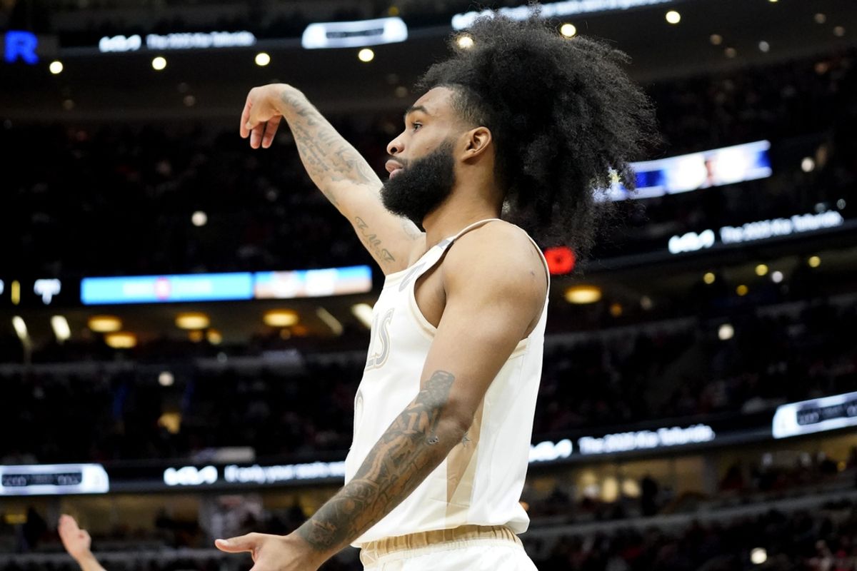 Jan 4, 2025; Chicago, Illinois, USA; Chicago Bulls guard Coby White (0) gestures after making a three point basket against the New York Knicks during the first quarter at United Center. Mandatory Credit: David Banks-Imagn Images