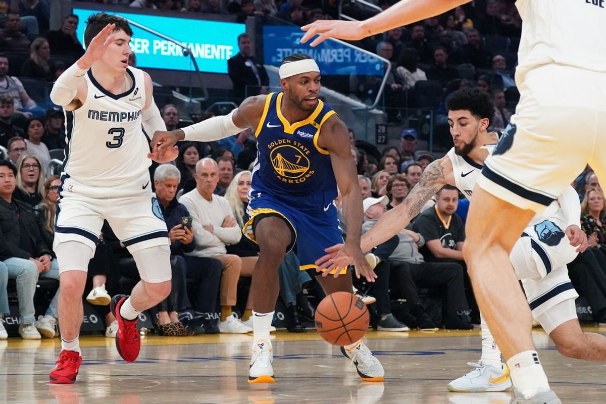 Jan 4, 2025; San Francisco, California, USA; Golden State Warriors guard Buddy Hield (7) is double-teamed by Memphis Grizzlies forward Jake LaRavia (3) and guard Scotty Pippen Jr. (1) in the second quarter against the Golden State Warriors at Chase Center. Mandatory Credit: David Gonzales-Imagn Images