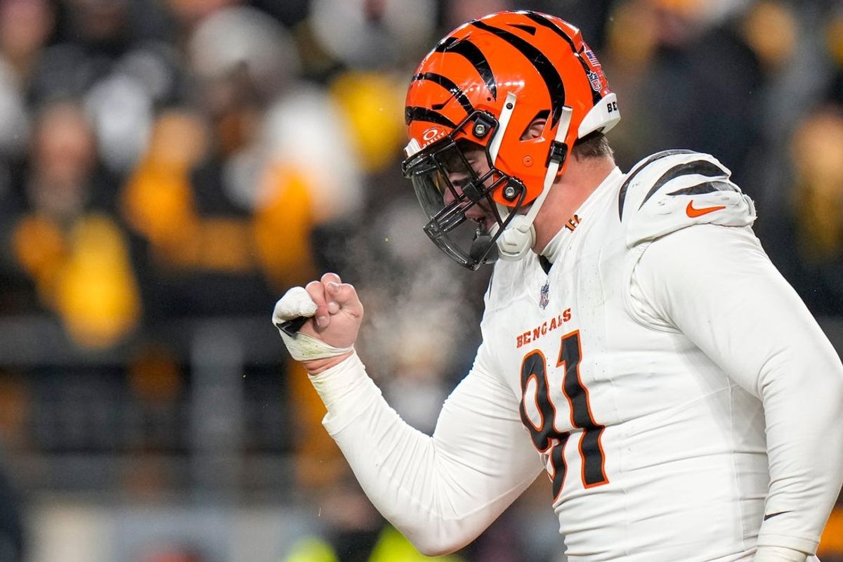 Cincinnati Bengals defensive end Trey Hendrickson (91) celebrates as the Steelers prepare to punt in the fourth quarter of the NFL Week 18 game between the Pittsburgh Steelers and the Cincinnati Bengals at Acrisure Stadium in Pittsburgh on Saturday, Jan. 4, 2025. The Bengals won 19-17 to finish the regular season at 9-8.