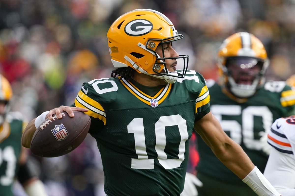 Jan 5, 2025; Green Bay, Wisconsin, USA;  Green Bay Packers quarterback Jordan Love (10) throws a pass during the first quarter against the Chicago Bears at Lambeau Field. Mandatory Credit: Jeff Hanisch-Imagn Images