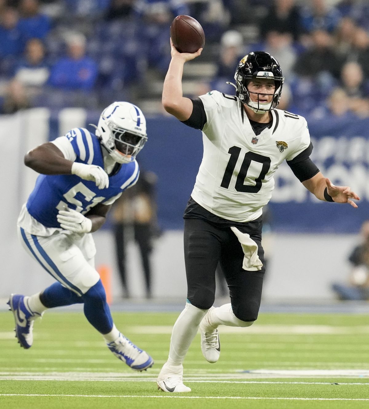 Jan 5, 2025; Indianapolis, Indiana, USA; Jacksonville Jaguars quarterback Mac Jones (10) looks to pass during a game against the Indianapolis Colts at Lucas Oil Stadium at Lucas Oil Stadium. Mandatory Credit: Christine Tannous/USA TODAY Network via Imagn Images