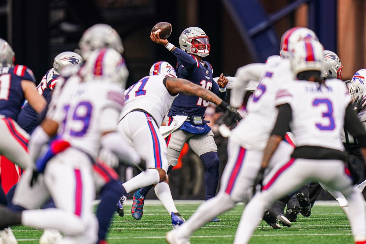 Jan 5, 2025; Foxborough, Massachusetts, USA; New England Patriots quarterback Joe Milton III (19) throws a pass against the Buffalo Bills in the first half at Gillette Stadium. Mandatory Credit: David Butler II-Imagn Images
