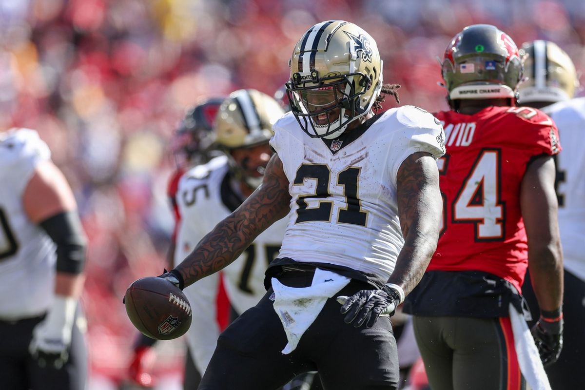 Jan 5, 2025; Tampa, Florida, USA; New Orleans Saints running back Jamaal Williams (21) reacts after a play against the Tampa Bay Buccaneers in the second quarter  at Raymond James Stadium. Mandatory Credit: Nathan Ray Seebeck-Imagn Images