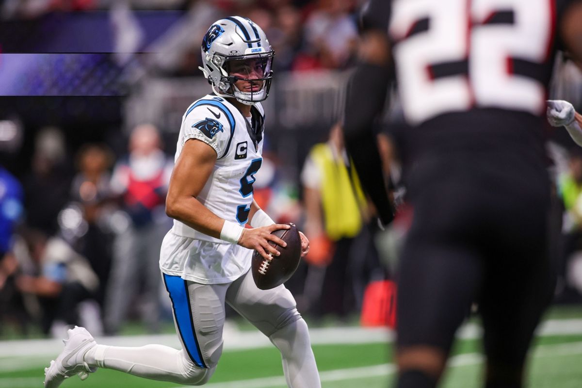 Jan 5, 2025; Atlanta, Georgia, USA; Carolina Panthers quarterback Bryce Young (9) runs for a touchdown against the Atlanta Falcons in the second quarter at Mercedes-Benz Stadium. Mandatory Credit: Brett Davis-Imagn Images