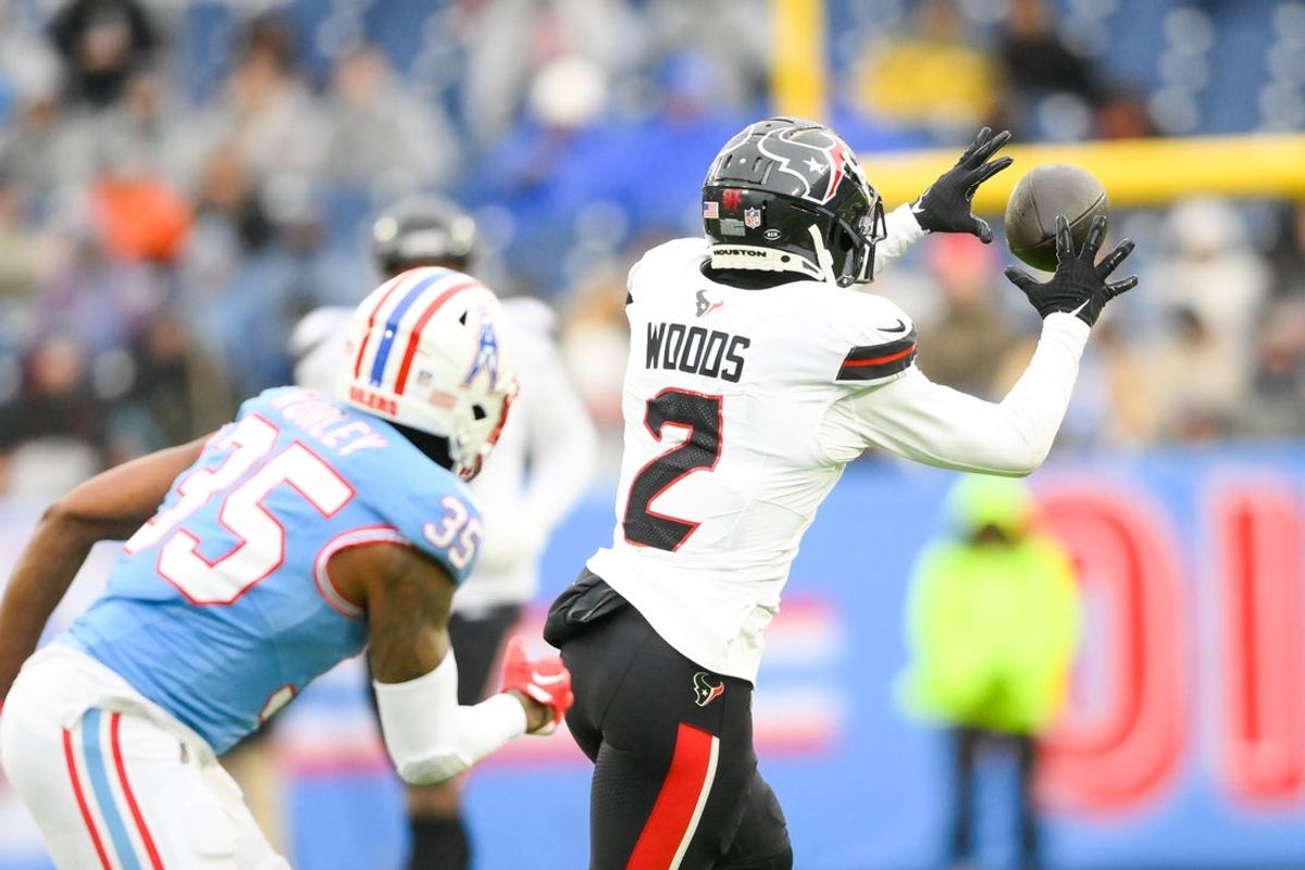 Jan 5, 2025; Nashville, Tennessee, USA; Houston Texans wide receiver Robert Woods (2) makes a catch over the middle against the Tennessee Titans during the first half at Nissan Stadium. Mandatory Credit: Steve Roberts-Imagn Images