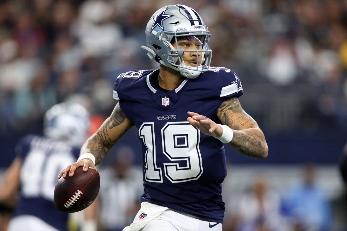 Jan 5, 2025; Arlington, Texas, USA; Dallas Cowboys quarterback Trey Lance (19) throws a pass against the Washington Commanders during the first quarter at AT&T Stadium. Mandatory Credit: Tim Heitman-Imagn Images