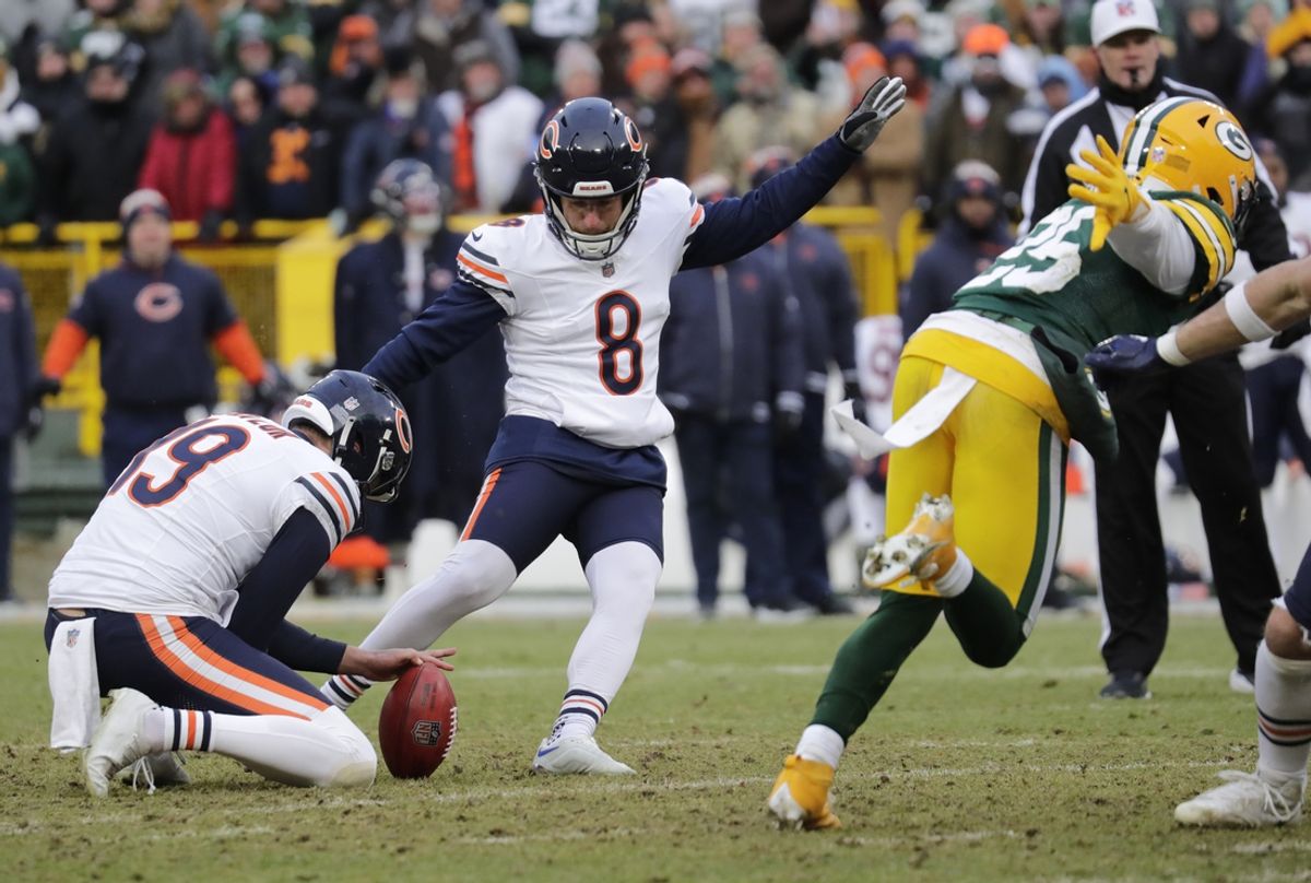 Jan 5, 2025; Green Bay, Wisconsin, USA; Chicago Bears place kicker Cairo Santos (8) kicks a 51-yard game-winning field against the Green Bay Packers during their football game Sunday, January 5, 2025 at Lambeau Field. Mandatory Credit: Dan Powers USA TODAY NETWORK-Wisconsin