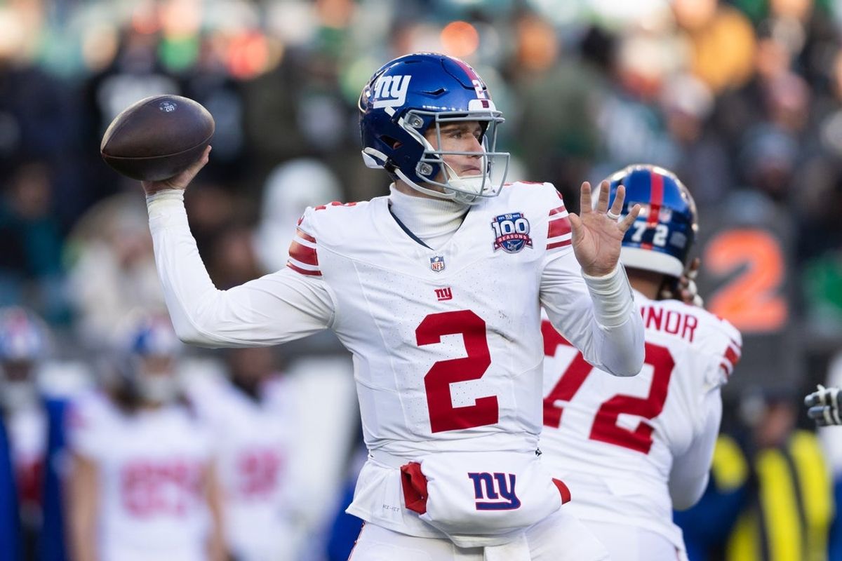 Jan 5, 2025; Philadelphia, Pennsylvania, USA; New York Giants quarterback Drew Lock (2)  passes the ball against the Philadelphia Eagles during the fourth quarter at Lincoln Financial Field. Mandatory Credit: Bill Streicher-Imagn Images