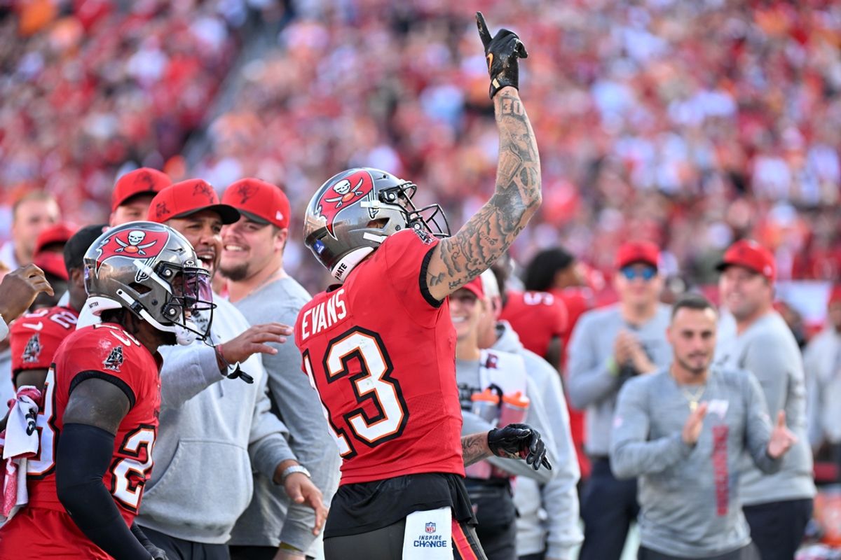 Jan 5, 2025; Tampa, Florida, USA; Tampa Bay Buccaneers wide receiver Mike Evans (13) celebrates after a reception to put him over 1,000 yards for the season in the second half against the New Orleans Saints at Raymond James Stadium. Mandatory Credit: Jonathan Dyer-Imagn Images