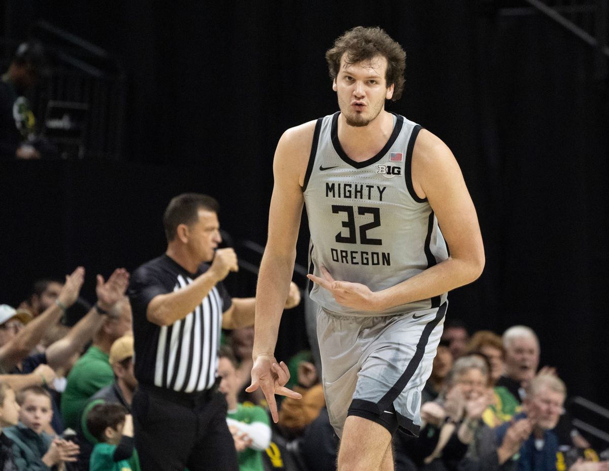 Oregon’s Nate Bittle celebrates a 3-point shot against Maryland during the firsthalf at Matthew Knight Arena in Eugene Sunday Jan. 5, 2025.