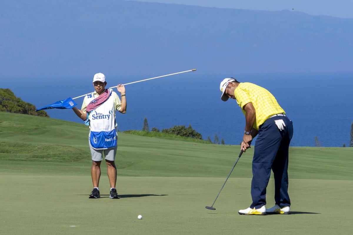 January 5, 2025; Maui, Hawaii, USA; Hideki Matsuyama putts on the fourth hole during the final round of The Sentry golf tournament at Plantation Course at Kapalua. Mandatory Credit: Kyle Terada-Imagn Images