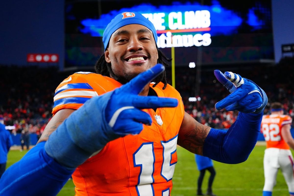 Jan 5, 2025; Denver, Colorado, USA; Denver Broncos linebacker Nik Bonitto (15) following the win against the Kansas City Chiefs at Empower Field at Mile High. Mandatory Credit: Ron Chenoy-Imagn Images