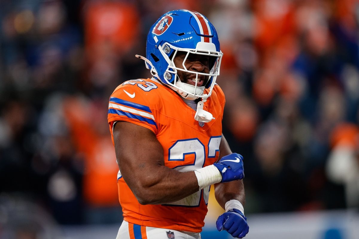 Jan 5, 2025; Denver, Colorado, USA; Denver Broncos running back Audric Estime (23) celebrates after a touchdown in the fourth quarter against the Kansas City Chiefs at Empower Field at Mile High. Mandatory Credit: Isaiah J. Downing-Imagn Images