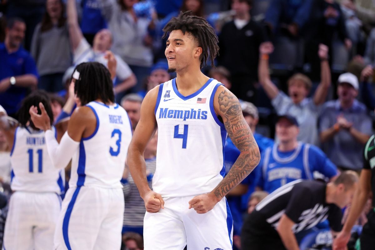 Jan 5, 2025; Memphis, Tennessee, USA; Memphis Tigers guard PJ Haggerty (4) reacts after a three point basket against the North Texas Mean Green during the second half at FedExForum. Mandatory Credit: Wesley Hale-Imagn Images