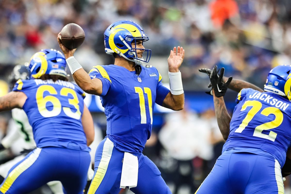 Jan 5, 2025; Inglewood, California, USA;  Los Angeles Quarterback Jimmy Garoppolo (11) throws for a reception at SoFi Stadium for the Seattle Seahawks at Los Angeles Rams Week 18 matchup. Mandatory Credit: William Navarro-Imagn Images