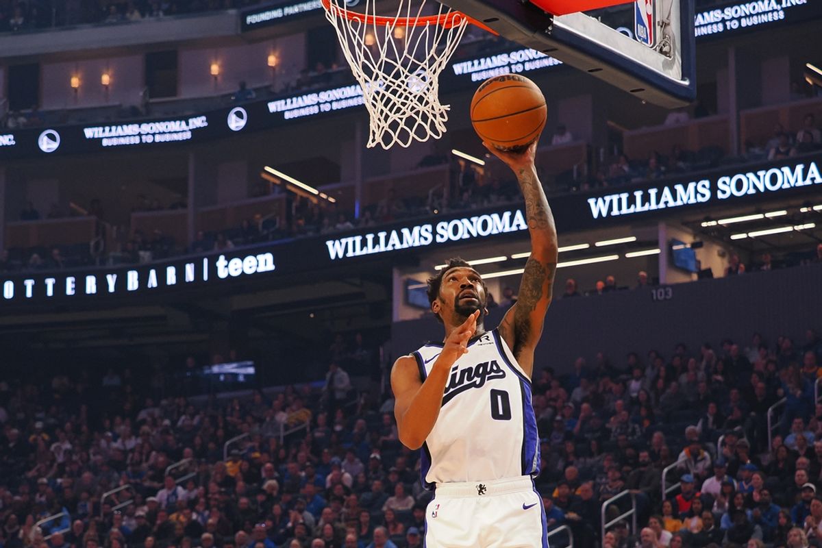 Jan 5, 2025; San Francisco, California, USA; Sacramento Kings guard Malik Monk (0) scores a basket against the Golden State Warriors during the first quarter at Chase Center. Mandatory Credit: Kelley L Cox-Imagn Images