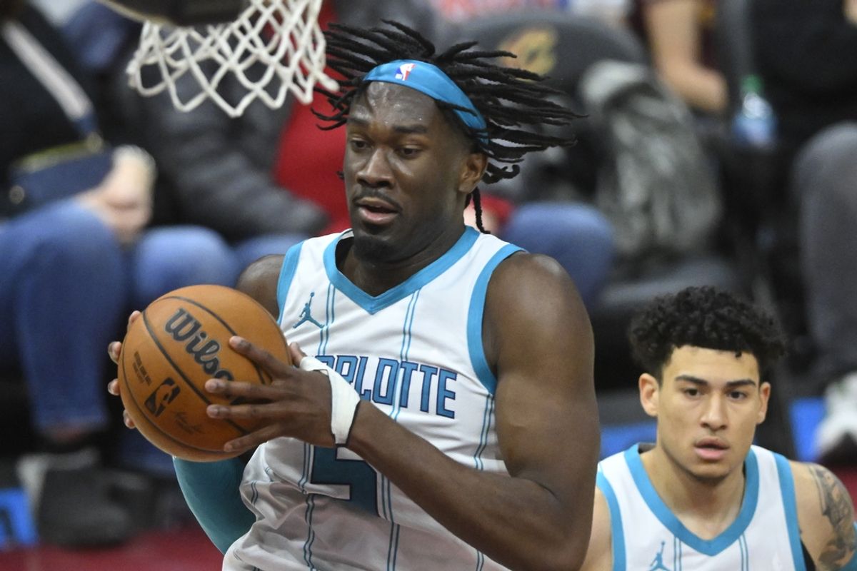 Jan 5, 2025; Cleveland, Ohio, USA; Charlotte Hornets center Mark Williams (5) rebounds in the fourth quarter against the Cleveland Cavaliers at Rocket Mortgage FieldHouse. Mandatory Credit: David Richard-Imagn Images