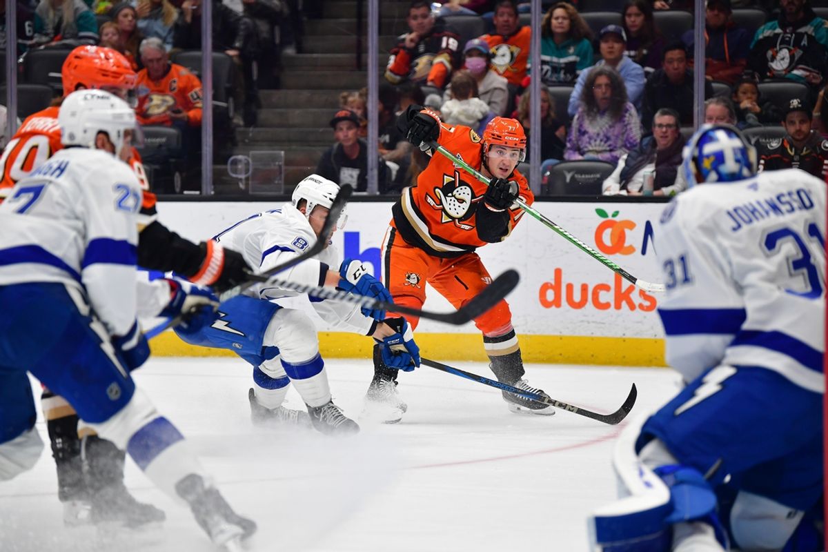 Jan 5, 2025; Anaheim, California, USA; Anaheim Ducks right wing Frank Vatrano (77) shoots on goal against the Tampa Bay Lightning during the second period at Honda Center. Mandatory Credit: Gary A. Vasquez-Imagn Images