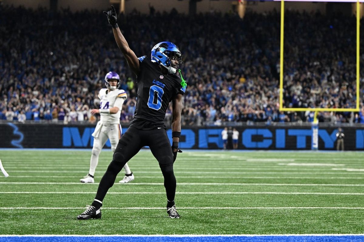 Jan 5, 2025; Detroit, Michigan, USA; Detroit Lions cornerback Terrion Arnold (0) celebrates after breaking up a fourth down pass by Minnesota Vikings quarterback Sam Darnold (14) in the end zone in the third quarter at Ford Field. The pass was incomplete.Mandatory Credit: Lon Horwedel-Imagn Images