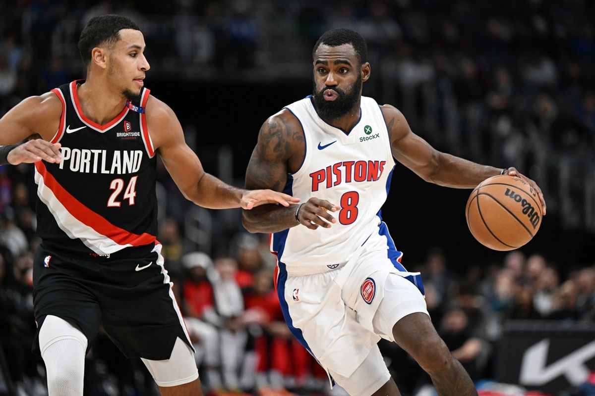 Jan 6, 2025; Detroit, Michigan, USA;  Detroit Pistons forward Tim Hardaway Jr. (8) drives past Portland Trail Blazers forward Kris Murray (24) in the fourth quarter at Little Caesars Arena. Mandatory Credit: Lon Horwedel-Imagn Images