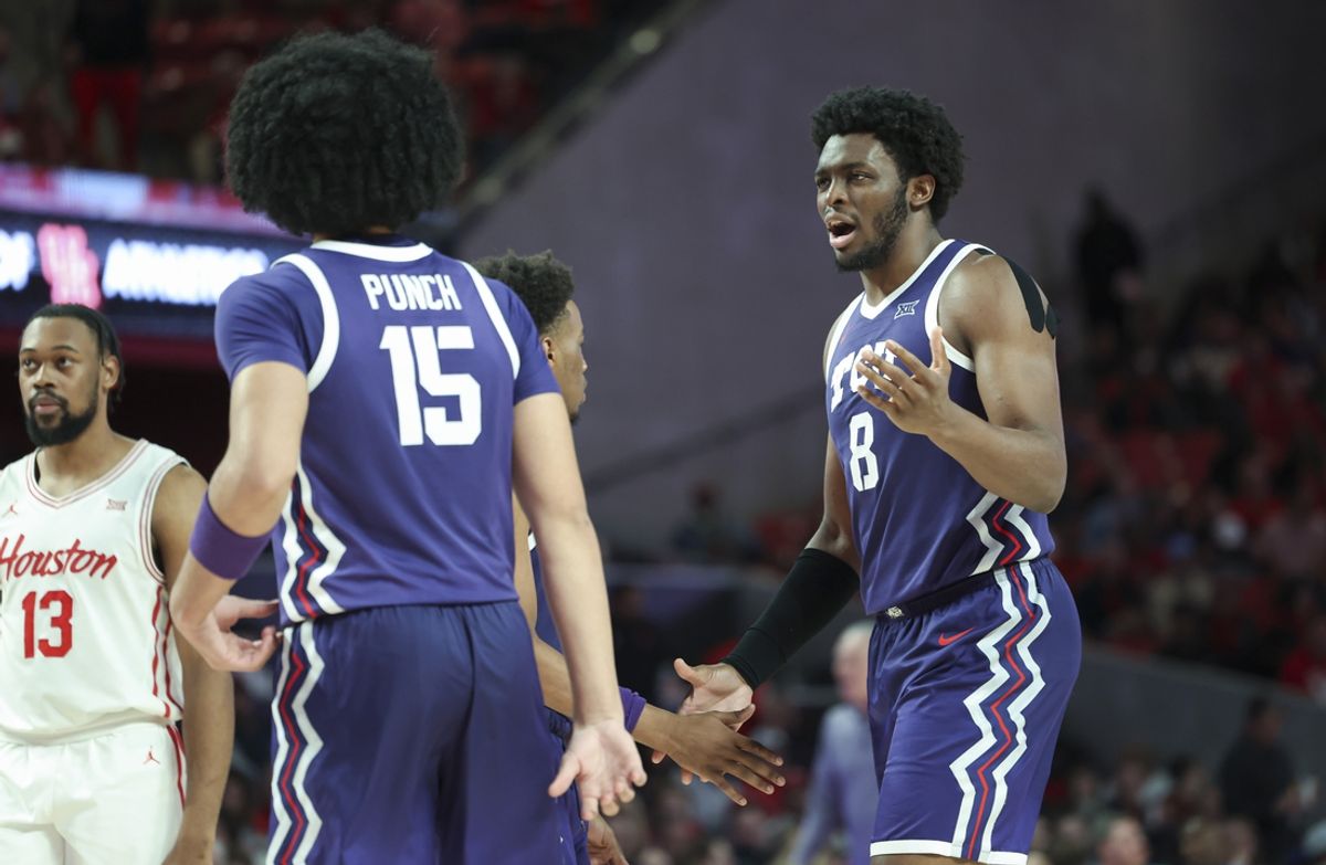 Jan 6, 2025; Houston, Texas, USA; TCU Horned Frogs center Ernest Udeh Jr. (8) reacts after a play during the second half against the Houston Cougars at Fertitta Center. Mandatory Credit: Troy Taormina-Imagn Images