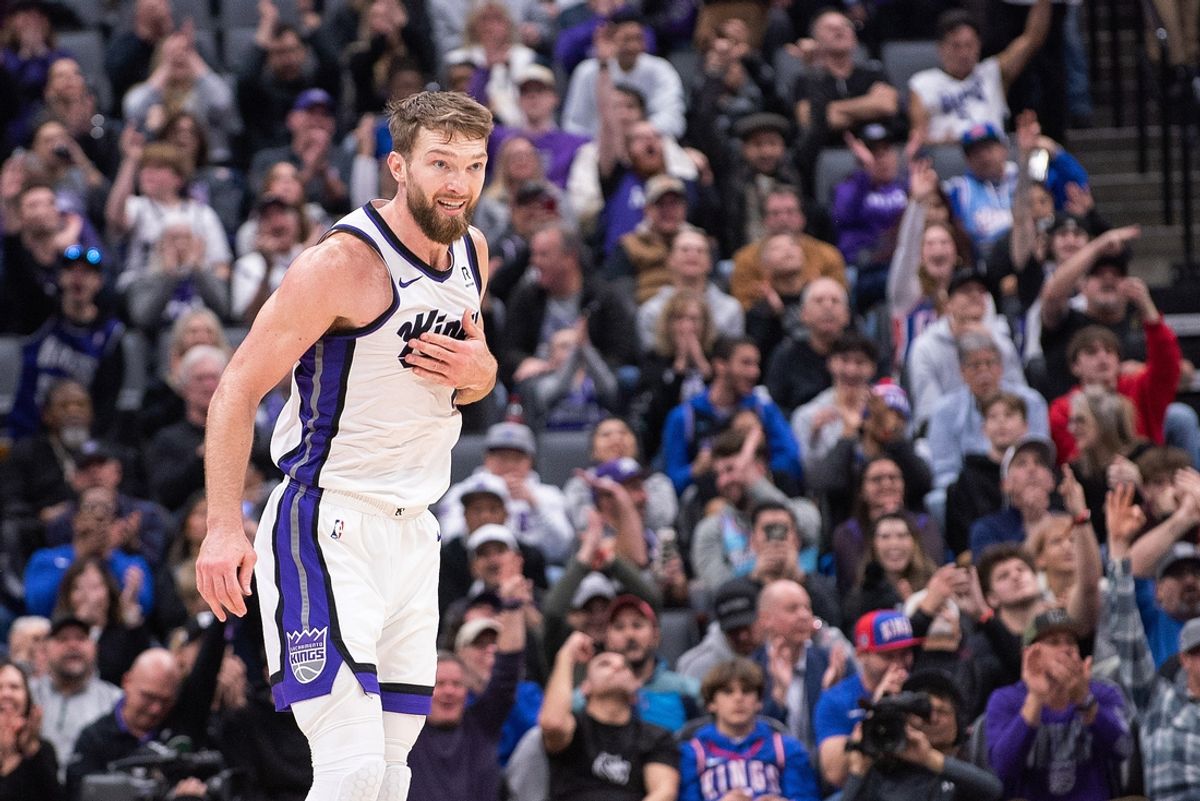 Jan 6, 2025; Sacramento, California, USA; Sacramento Kings forward Domantas Sabonis (11) celebrates after making a three point shot during the first quarter against the Miami Heat at Golden 1 Center. Mandatory Credit: Ed Szczepanski-Imagn Images