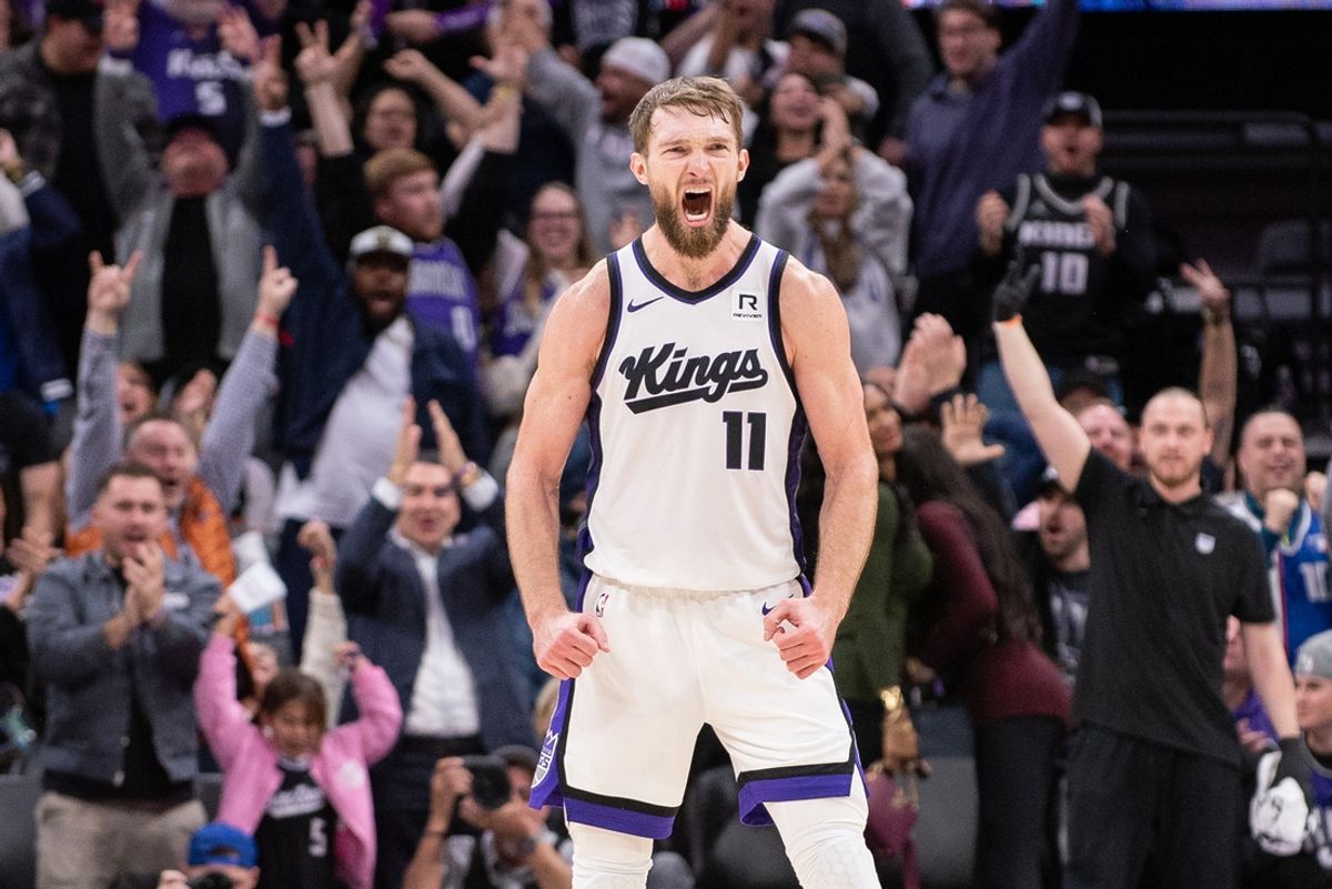 Jan 6, 2025; Sacramento, California, USA; Sacramento Kings forward Domantas Sabonis (11) reacts after making a three point shot against the Miami Heat during overtime at Golden 1 Center. Mandatory Credit: Ed Szczepanski-Imagn Images
