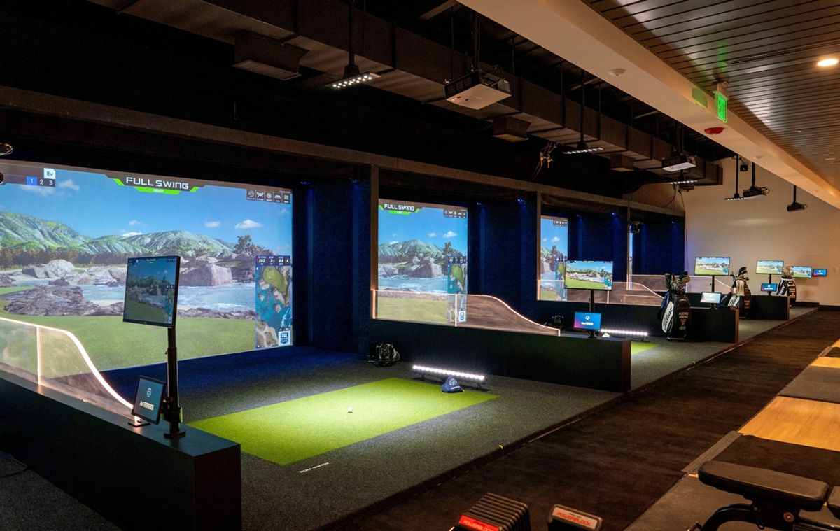 Virtual golfing bays for players to warm up before their matches at the SoFi Center, the home of TGL, the interactive golf league founded by Tiger Woods and Rory McIlroy on January 7, 2025 in Palm Beach Gardens, Florida.