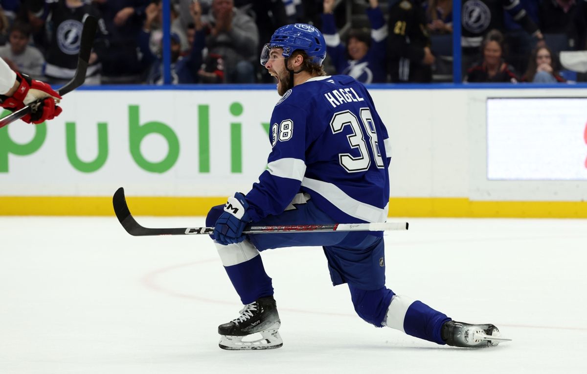 Jan 7, 2025; Tampa, Florida, USA; Tampa Bay Lightning left wing Brandon Hagel (38) celebrates after he scored a goal against the Carolina Hurricanes during the first period at Amalie Arena. Mandatory Credit: Kim Klement Neitzel-Imagn Images